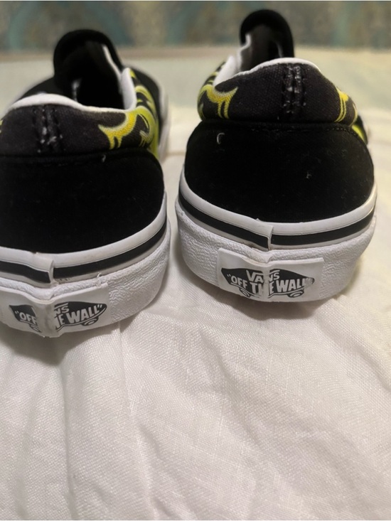 Vans Kids Slip-On Sneakers in Black and Yellow Flame Pattern - Picture 7 of 7